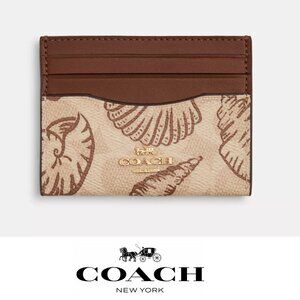 Coach Slim Id Card Case In Signature Canvas With Shell Print